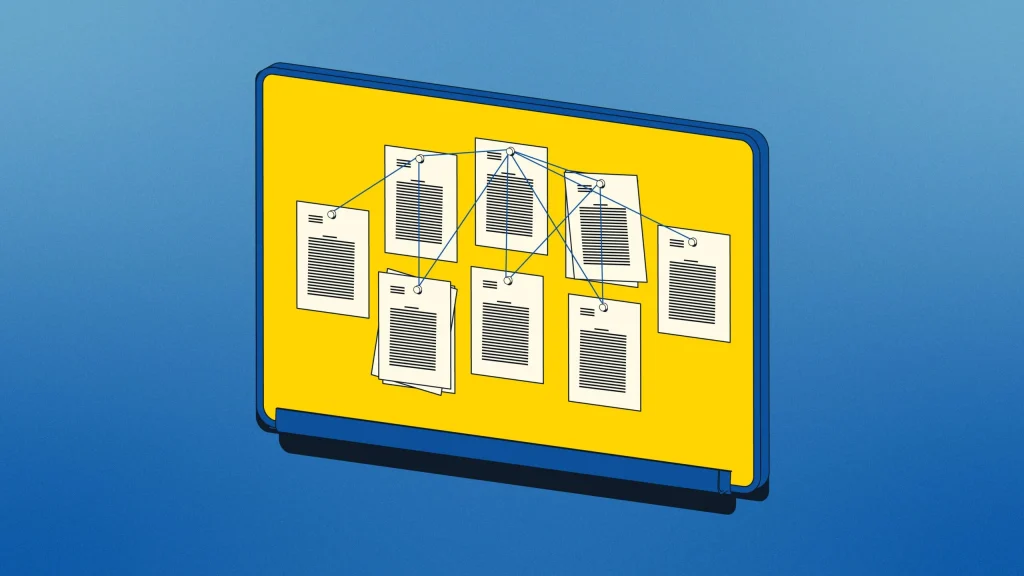 board with papers with connected threads